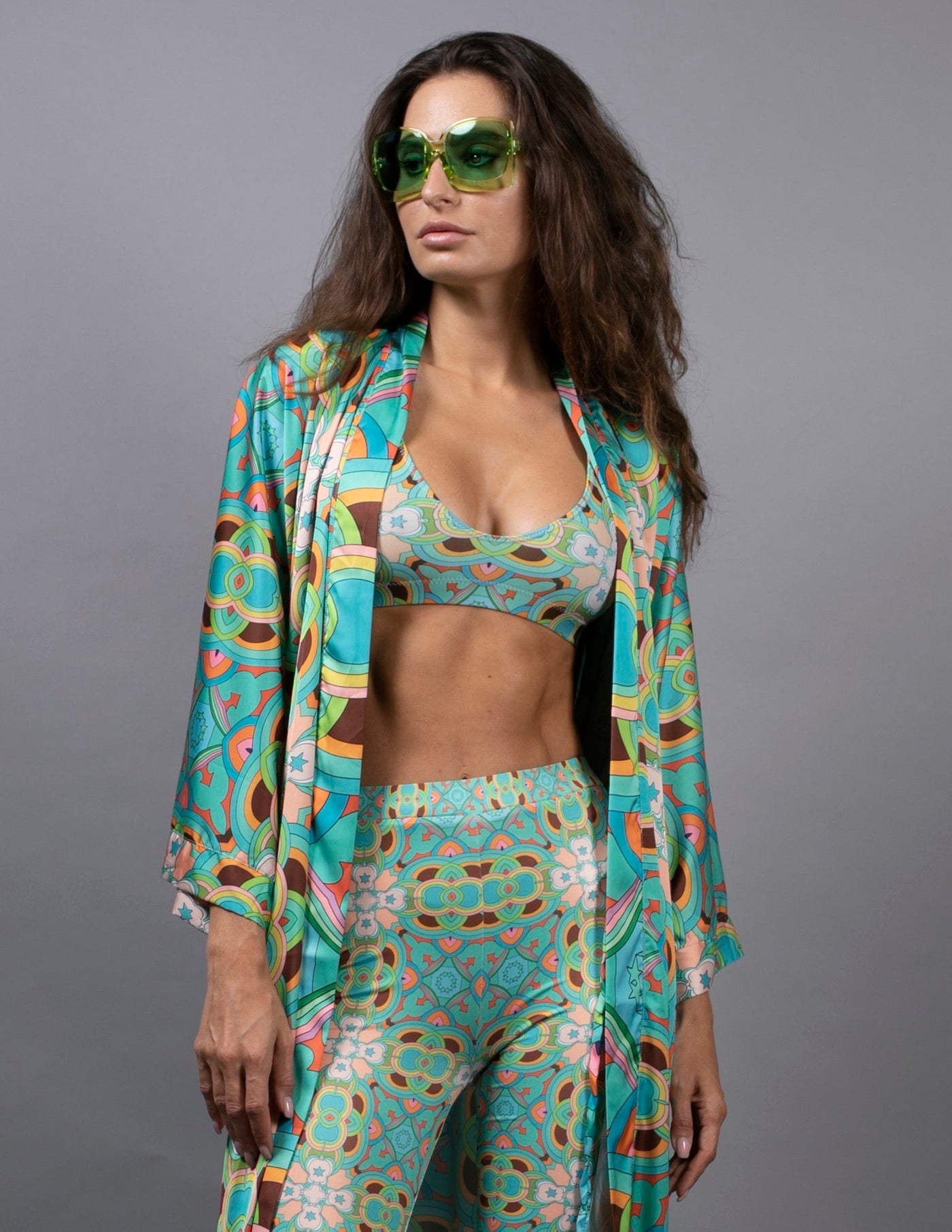 PSYCHEDELIC CROSSES STAR TEAL FLARED PANTS