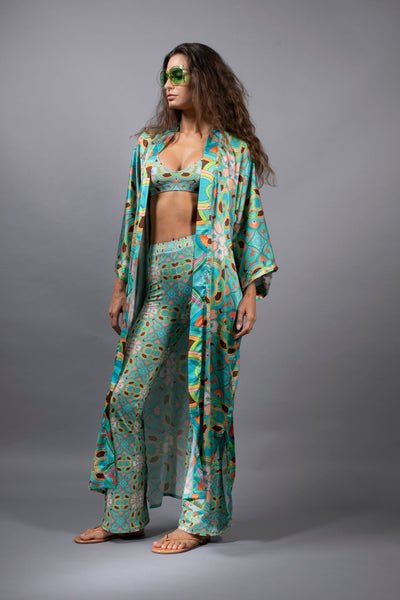 PSYCHEDELIC CROSSES STAR TEAL FLARED PANTS
