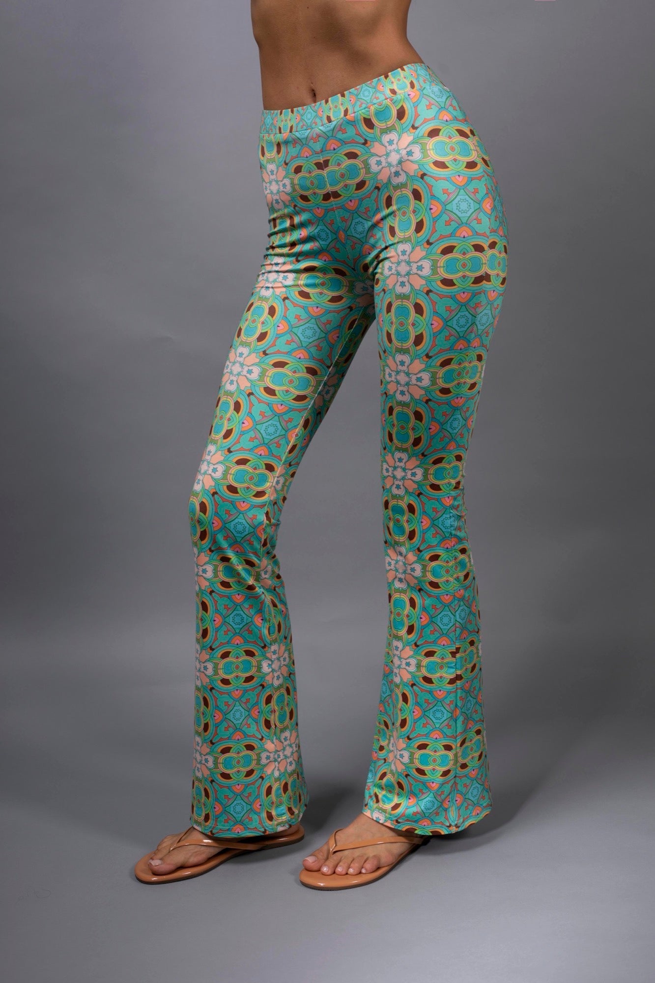 PSYCHEDELIC CROSSES STAR TEAL FLARED PANTS